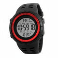Black digital watch with red accents on a white background